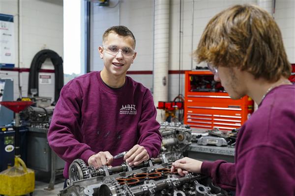 Automotive Technology student working on cars